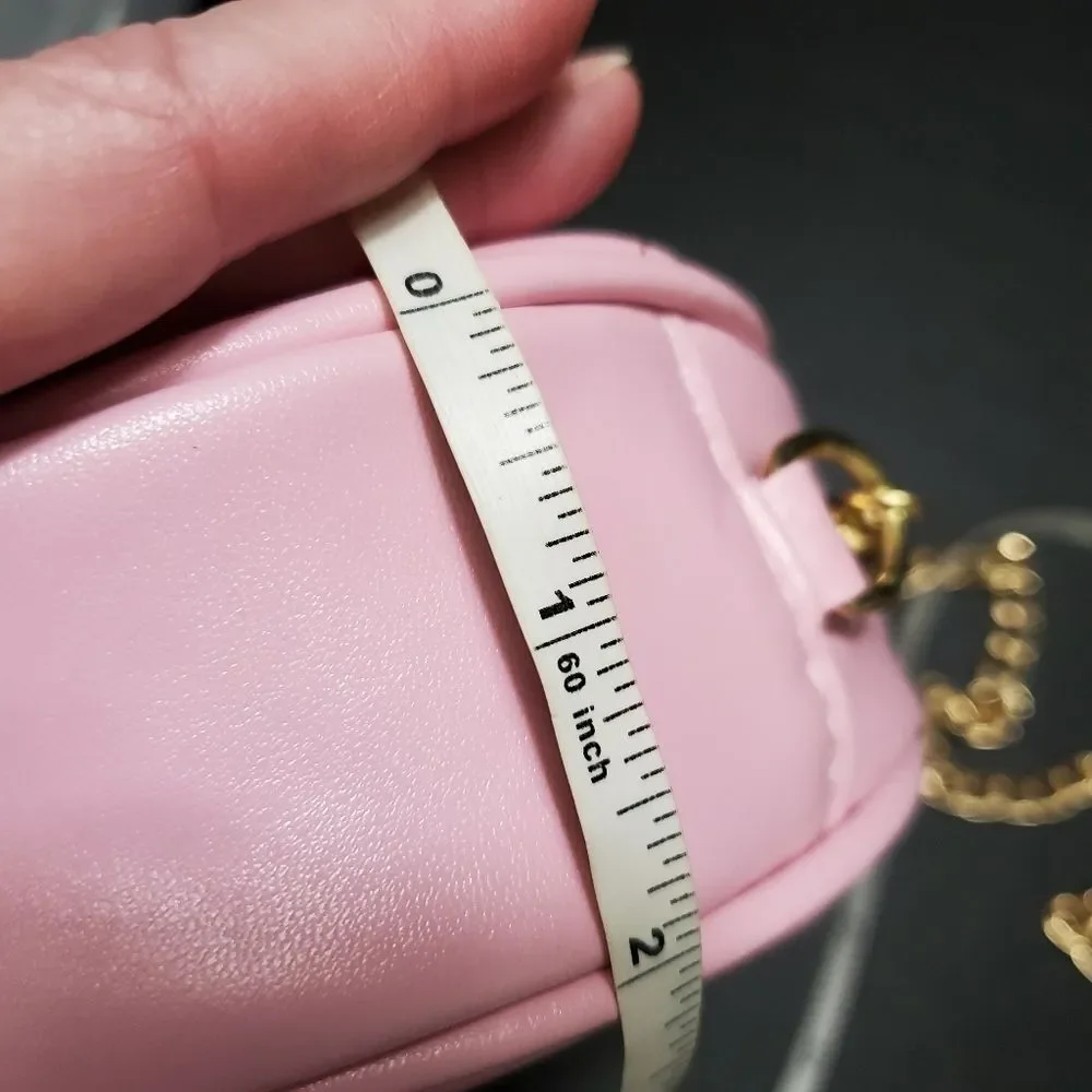 Round pink crossbody with faux pearls